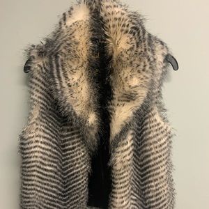 Faux fur vest in excellent condition-size M, perfect for fall and winter